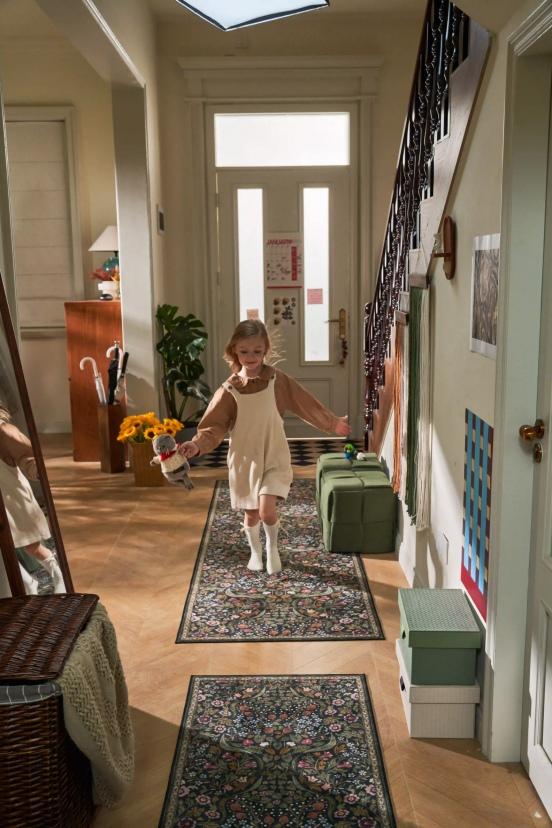 Girl on Floral Hallway Rugs, Light Neutral Palette